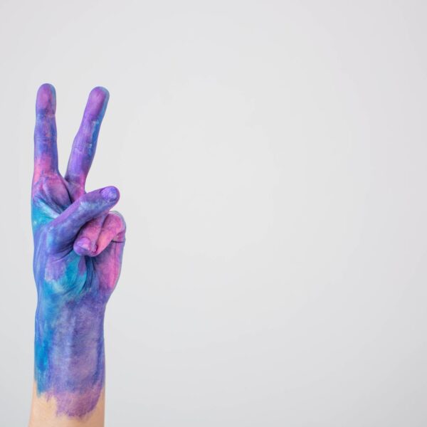 hand covered with paint