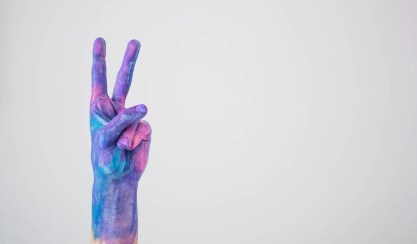 hand covered with paint